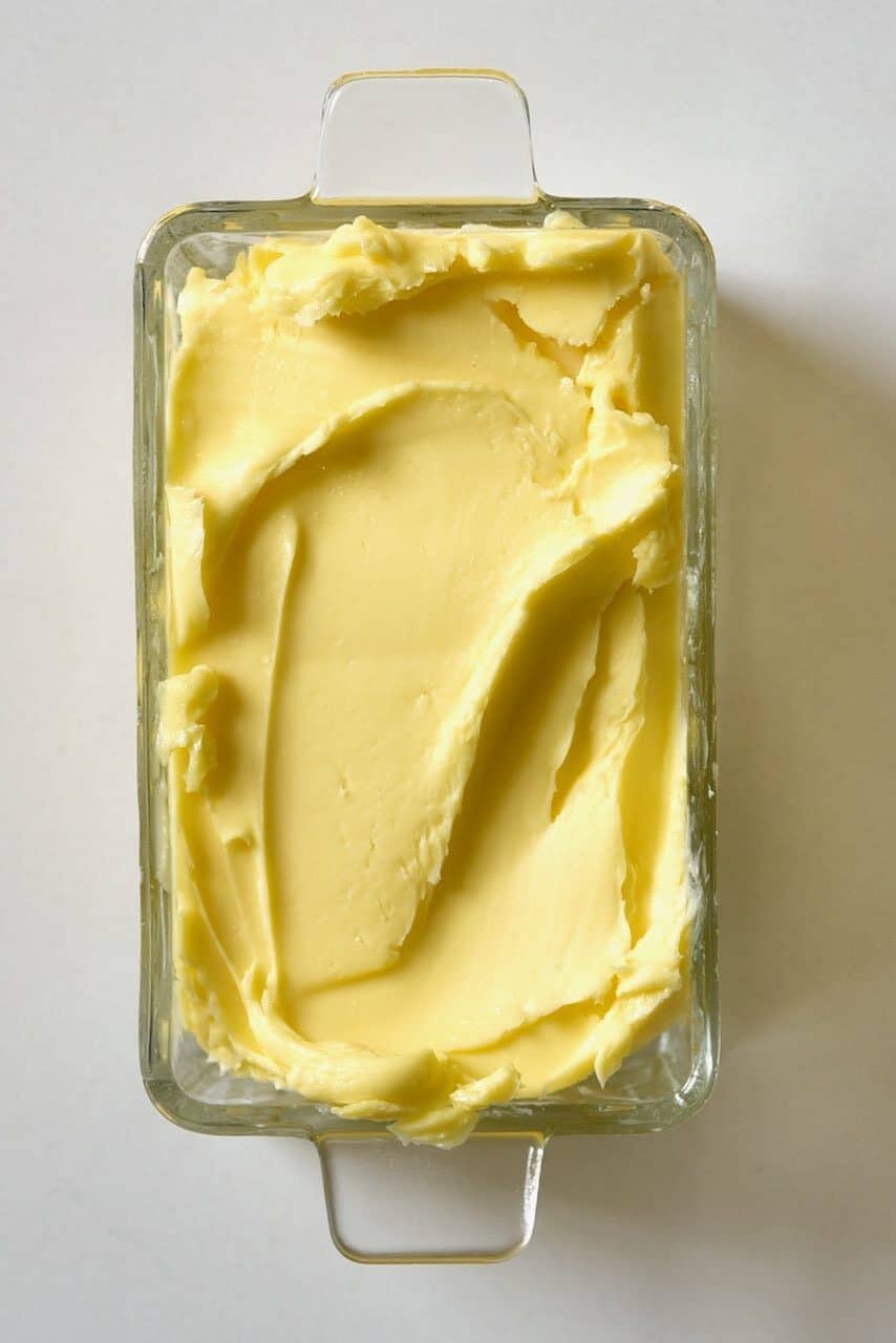 https://www.alphafoodie.com/wp-content/uploads/2020/06/butter-inside-a-glass-container-e1592233146934.jpeg
