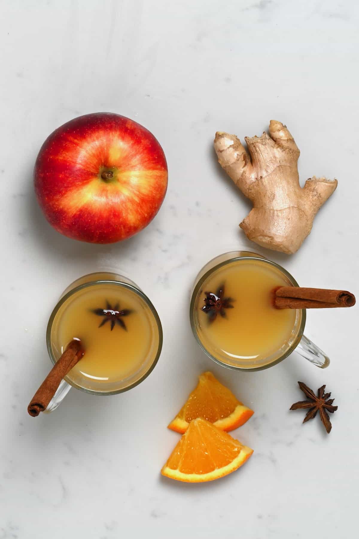 https://www.alphafoodie.com/wp-content/uploads/2021/11/Spice-Apple-Cider-Two-glasses-with-spiced-apple-cider.jpeg