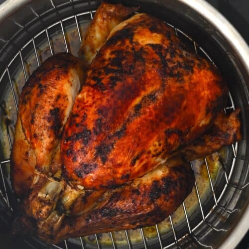https://www.alphafoodie.com/wp-content/uploads/2022/11/Air-Fryer-Roasted-Whole-Chicken-square-new-500x500.jpeg