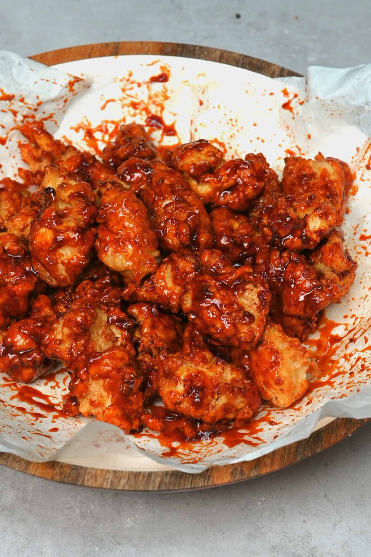 https://www.alphafoodie.com/wp-content/uploads/2023/08/Korean-Fried-Chicken-Fried-chicken-covered-with-red-chili-sauce.jpeg